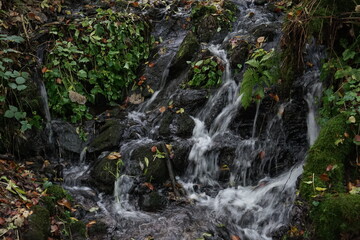 Water flowing down small waterfall