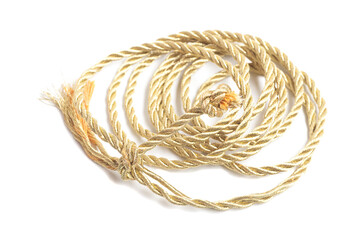 Golden rope isolated on a white background