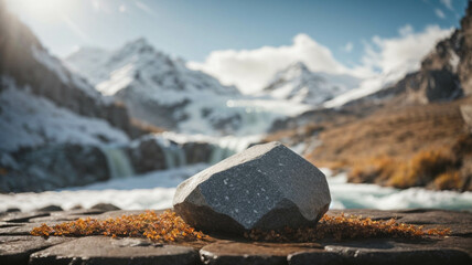 empty space of thaw shore with stones, stone on snowy mountain outdoor background and blurred bokeh waterfall, for display of assembly products, space for text - obrazy, fototapety, plakaty