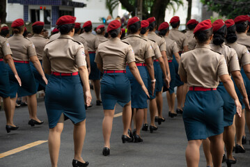 Female military police officers parade during tributes to Brazilian Independence Day in the city of Salvador, Bahia. - obrazy, fototapety, plakaty