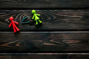 Equal rights of men and women, feminism concept. Male and female figurines, top view