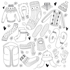 Collection of winter clothes. Set of winter accessories. Hand drawn winter hats, scarfs, mittens and socks. Knitted wool clothes. Vector illustration in doodle style