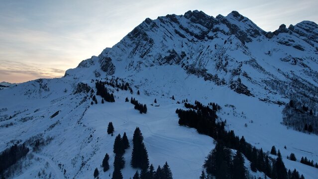 sunset light in winter mountain landscape