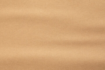 Kraft paper texture. Brown cardboard background
