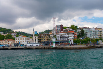 Arnavutkoy village historic waterfront commercial buildings at Bosporus strait waterside at Besiktas district in historic city of Istanbul, Turkey. 