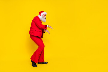 Full size profile photo of positive person dancing x-mas eve event empty space isolated on yellow color background