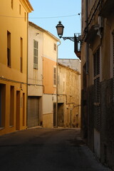 narrow street in the old town of Artà, Mallorca, Spain