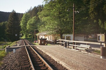 Forellenhof, Germany - June 03, 2023: view of small train station in Ore mountains - analog