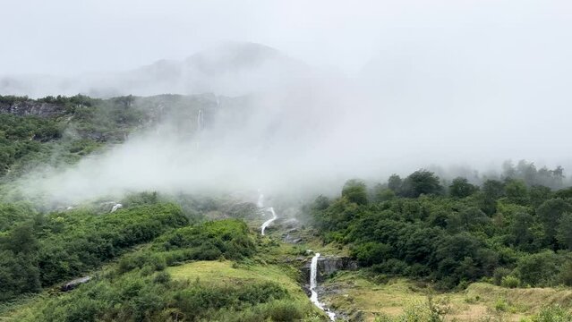 A scene of a very rainy day at Oldevatnet Lake and the Briksdal Valley, Norway