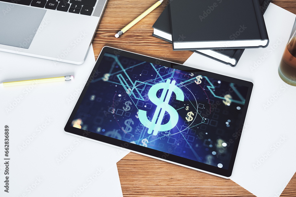 Poster top view of modern digital tablet monitor with creative usd symbols hologram. banking and investing 