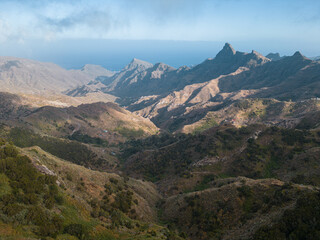 Naklejka premium fog with wind and misty cloud in green mountains, Anaga park, Tenerife, Canary
