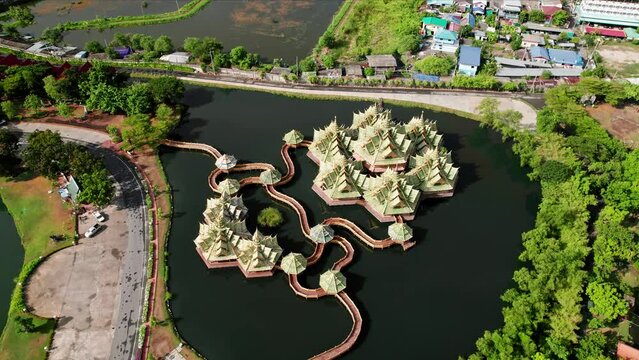 Beautiful buddhist temple in a town near Bangkok. Aerial drone footage 