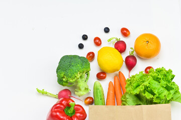 Healthy food background, healthy vegetarian food in paper bags, fruits and vegetables, banner copy space, supermarket shopping, food and clean vegetarian diet concept, organic fruits and vegetables co