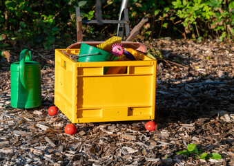 Plastic container ful of kids toys for play outside