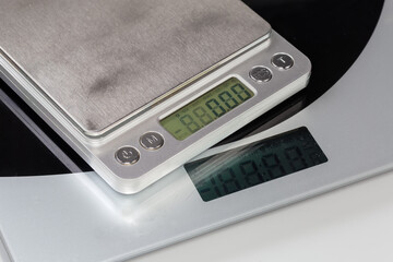 Two different empty digital table top scale, fragment close-up