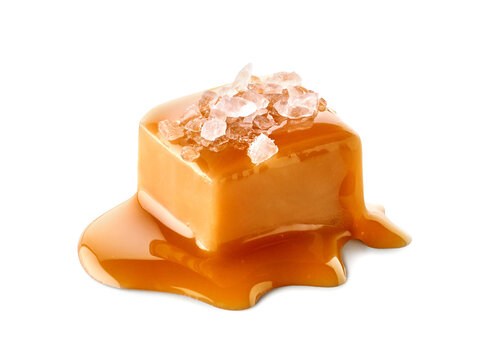 One piece of salty caramel candy on white background