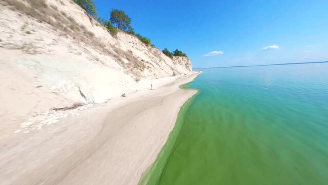 FPV, Ukraine, View from the mountain Pivikha on the Kremenchuk water reservoir near Svitlovodsk, Kirovograd region, Ukraine. Natural background in a sunny summer day.