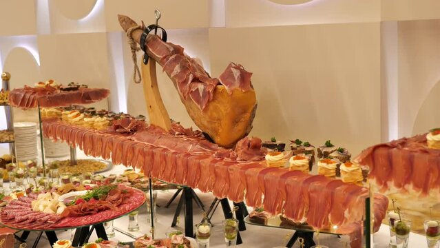 Banquet jamon. Banquet table with many snacks and delicacies