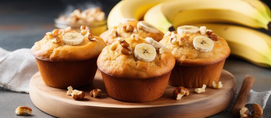 Naklejka na ściany i meble Banana muffins with nuts made at home With copyspace for text
