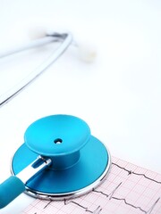 blue stethoscope on a white background 