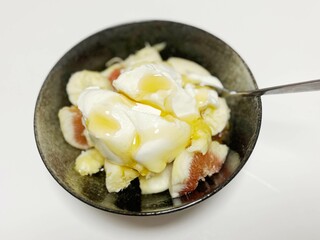 High protein yogurt and fresh fruit (fig and banana)