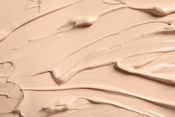 Fototapeta na wymiar Texture of skin foundation as background, closeup