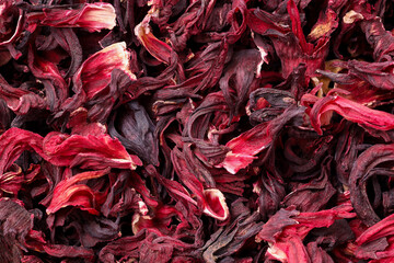 Dry hibiscus tea as background, top view © New Africa