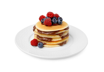 Stack of tasty pancakes with chocolate spread and berries isolated on white