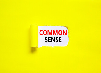 Common sense symbol. Concept words Common sense on beautiful white paper. Beautiful yellow paper background. Business, motivational common sense concept. Copy space.