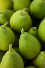 Many fresh green figs as background, closeup