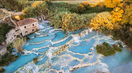 Tafelkleed Most famous natural thermal hot spings pools in Tuscany -  scenic Terme di Mulino vecchio ( Thermals of Old Windmill) in Grosseto province. Aerial drone view © Freesurf