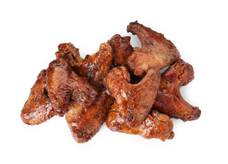 Pile of chicken wings glazed with soy sauce isolated on white, top view