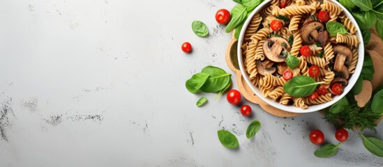 Flatlay stock photo of vegan pasta bowl with mushrooms and spinach With copyspace for text - obrazy, fototapety, plakaty