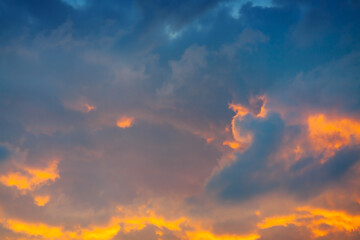 Evening sky with orange clouds during sunset