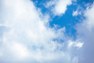 Blue sky with white clouds. Background with clouds