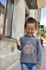 Happy boy kid traveling smiling