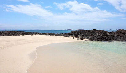 Empty beach on a beautiful uninhabited island, Galapagos Islands, Ecuador.