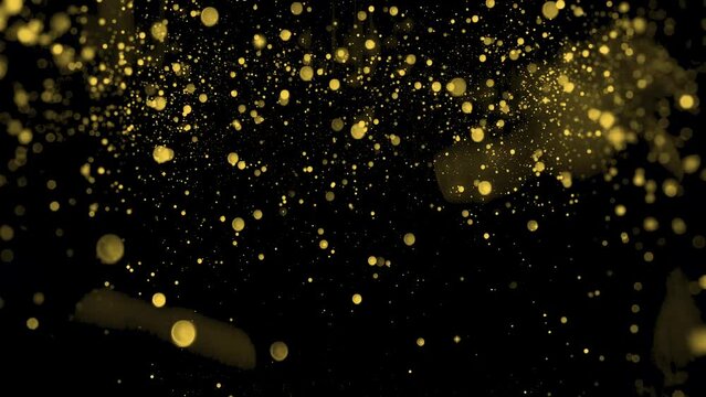 gold particles abstract background with golden shining stars dust bokeh glitter awards dust. Futuristic glittering fly movement flickering loop in space on black background.