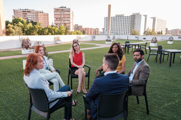 Fototapeta premium Group of coworking workers doing a few hours of coexistence to improve performance. Concept: business, teamwork, leadership