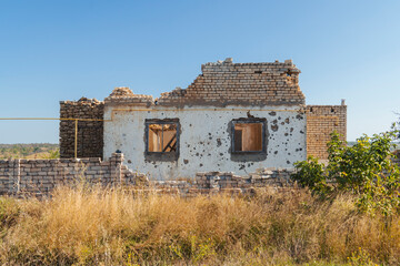 Countryside. A house destroyed by shelling. War in Ukraine