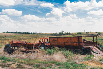 Damaged agricultural equipment destroyed by artillery fire. War in Ukraine