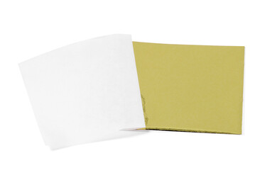 One edible gold leaf sheet isolated on white