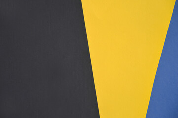 abstract background for the design. colored sheets of paper, geometric lines. blue, yellow colors