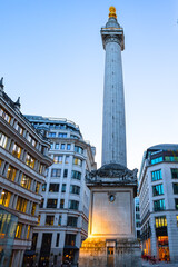 The Monument to the Great Fire of London at sunset, more commonly known simply as the Monument, is...