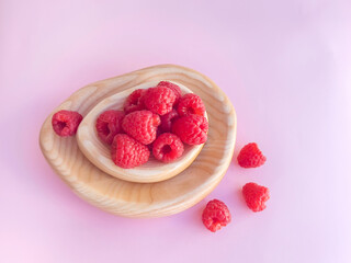 Raspberry on a pink background 