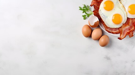 Bacon and eggs on a light gray background. Copy space. Food Photography
