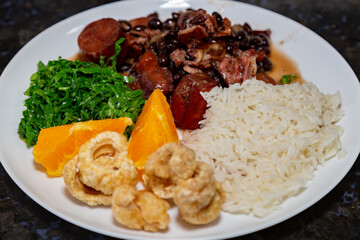 Traditional Brazilian feijoada complete