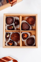 Handmade chocolate with pistachios, dark and milk chocolate pieces.