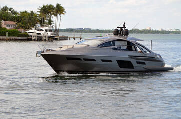 Luxury motor yacht cruising off Riva Alto island,Miami Beach,Florida