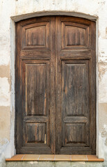 Fototapeta na wymiar Old and worn wooden door 